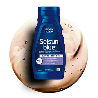 Image of product bottle over a circle of orange shampoo.